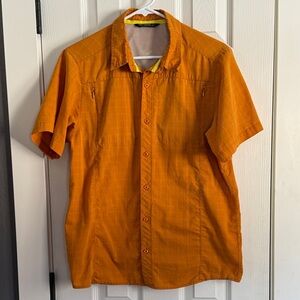 Men’s size small Arctyrex brand short sleeve Madris style button up shirt.